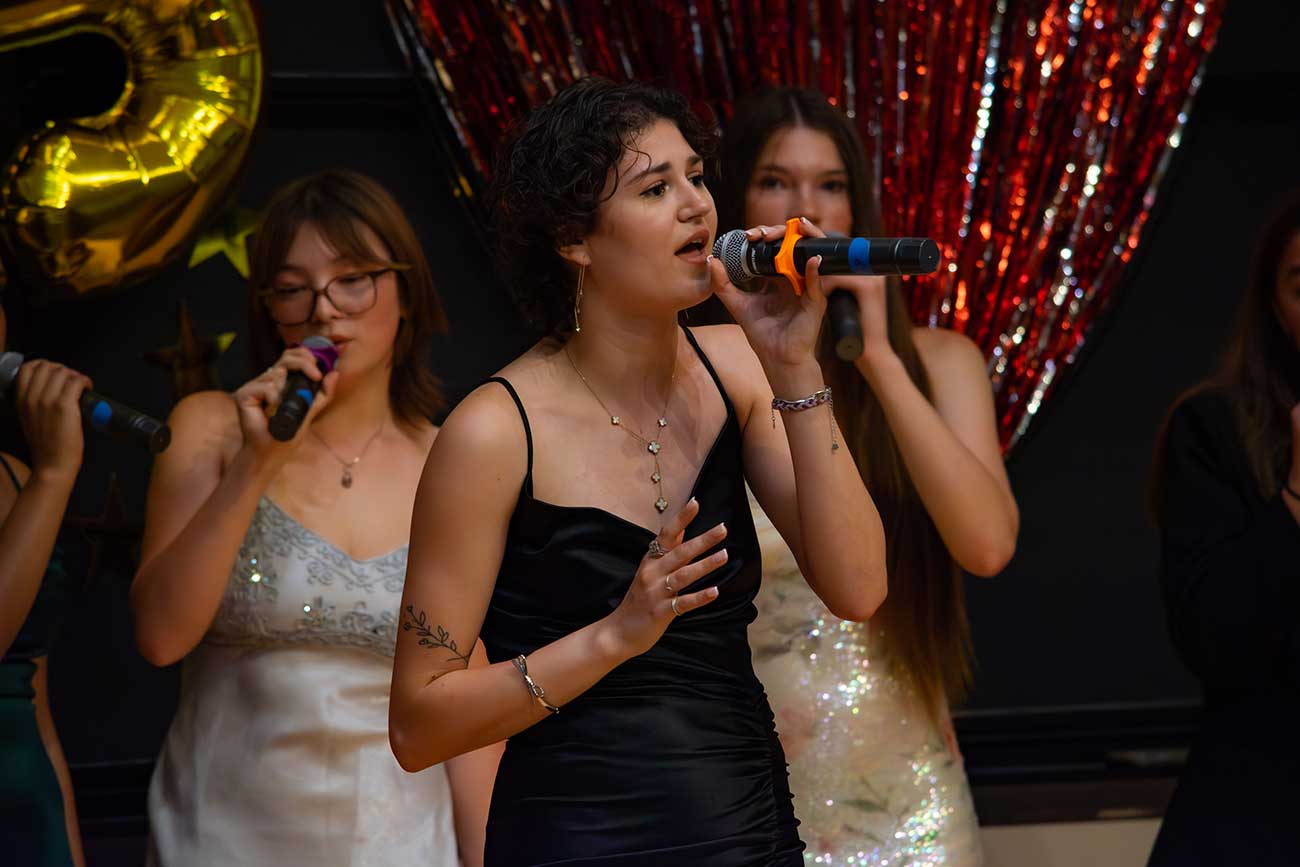 April singing her senior solo at the Drexel Treblemakers senior sendoff concert
