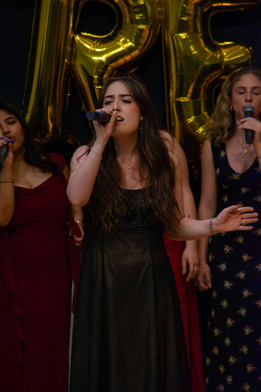 Maya singing her senior solo at the Drexel Treblemakers senior sendoff concert